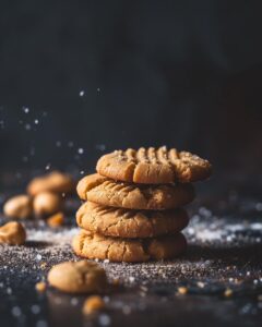 "Ingredients laid out for peanut butter cookie recipe without brown sugar preparation."