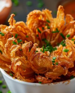 "Guide on how to reheat bloomin onion to preserve its crispy texture."