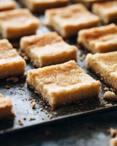 "Ingredients and tools for a beginner-friendly shortbread crust recipe laid out on a counter."